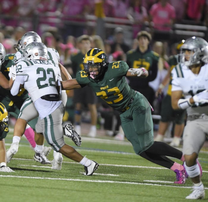Marco Jones (23) had 22 tackles in a 17-7 loss to De La Salle on Nov. 17